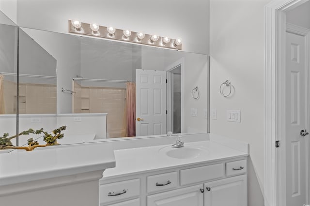 bathroom with a shower with curtain and vanity