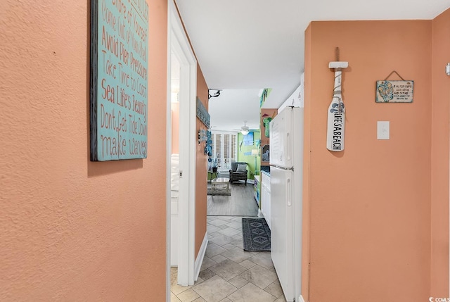 7000 Ocean Blvd N Unit 133, Myrtle Beach, SC 29572 - corridor featuring a textured wall and baseboards