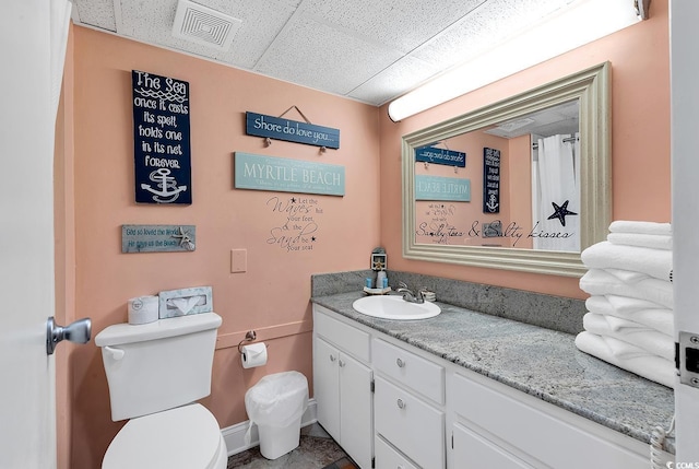 7000 Ocean Blvd N Unit 133, Myrtle Beach, SC 29572 - bathroom featuring a drop ceiling and vanity