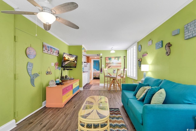 7000 Ocean Blvd N Unit 133, Myrtle Beach, SC 29572 - living room featuring ornamental molding, wood finished floors, and ceiling fan