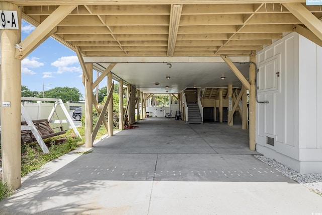 view of parking featuring a carport