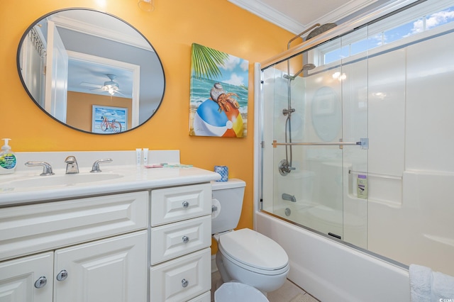 full bathroom featuring enclosed tub / shower combo, toilet, vanity, ceiling fan, and ornamental molding