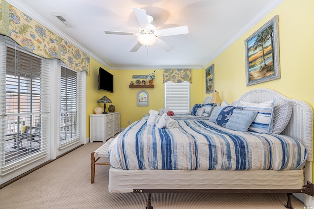 carpeted bedroom with access to exterior, crown molding, and ceiling fan