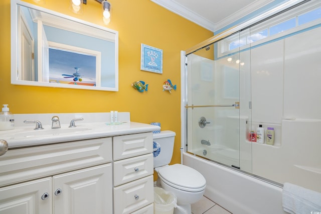 full bathroom with vanity, ceiling fan, combined bath / shower with glass door, crown molding, and toilet