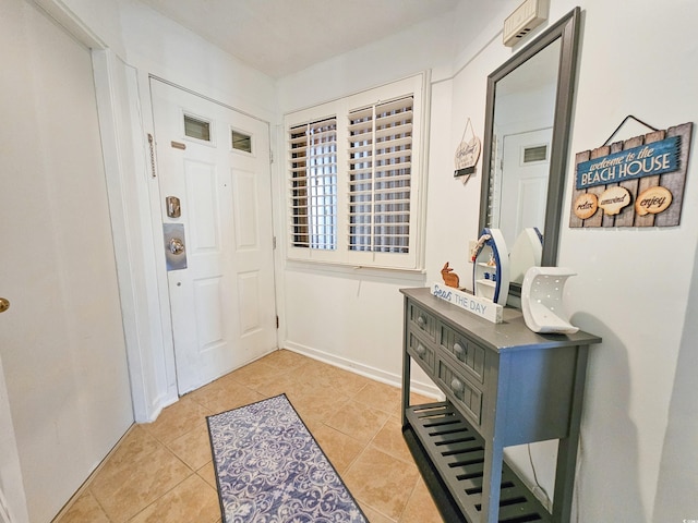 entrance foyer with light tile patterned flooring