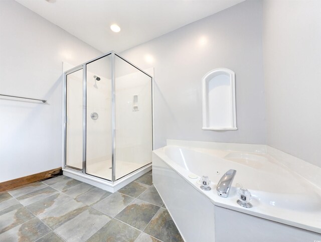 bathroom with independent shower and bath