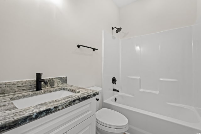 full bathroom with toilet, vanity, and bathing tub / shower combination