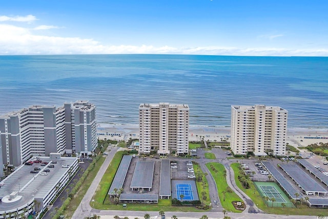 aerial view featuring a water view and a view of the beach