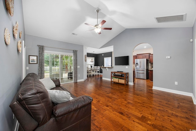 living room with dark wood-type flooring, lofted ceiling, and ceiling fan