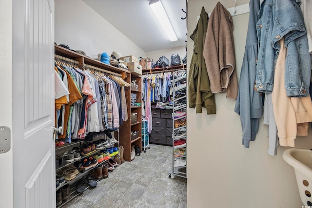 spacious closet with light tile patterned flooring