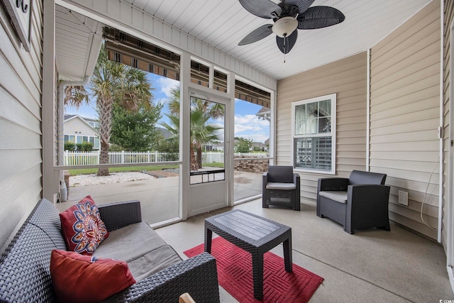 sunroom / solarium with ceiling fan