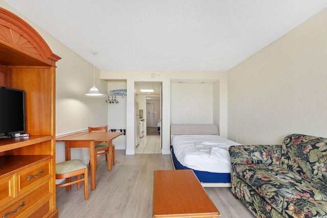 bedroom featuring light hardwood / wood-style floors