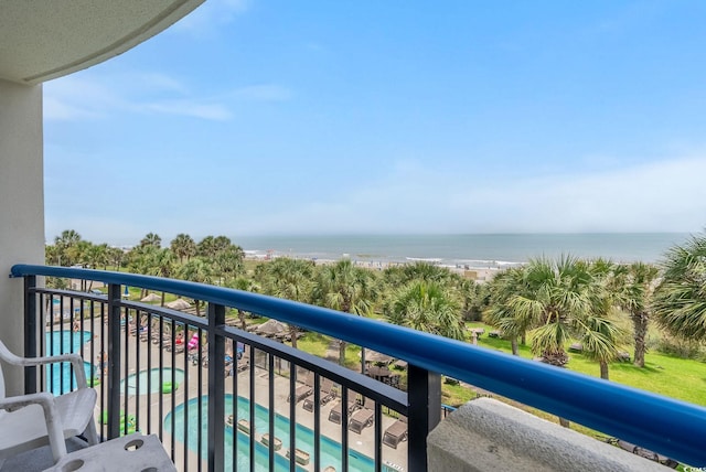 balcony featuring a water view