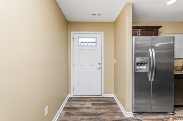 doorway to outside featuring hardwood / wood-style flooring