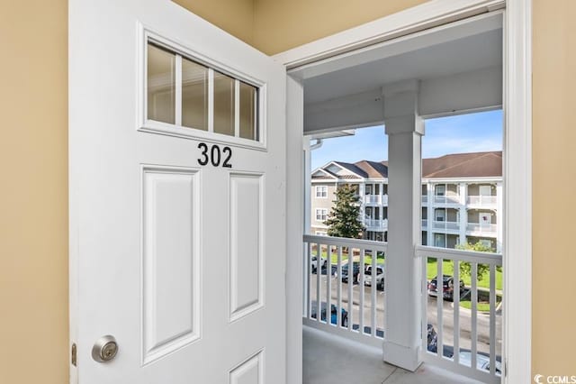 doorway to outside featuring plenty of natural light