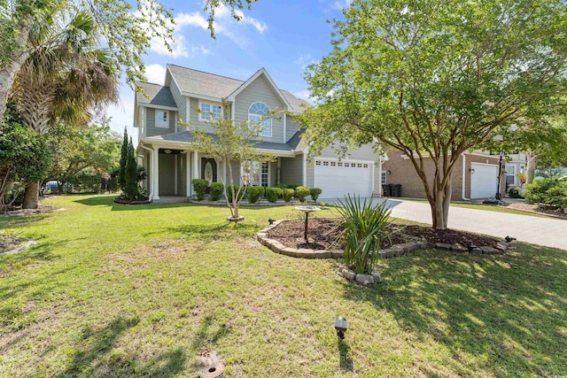 view of front facade with a front lawn, a porch, and a garage