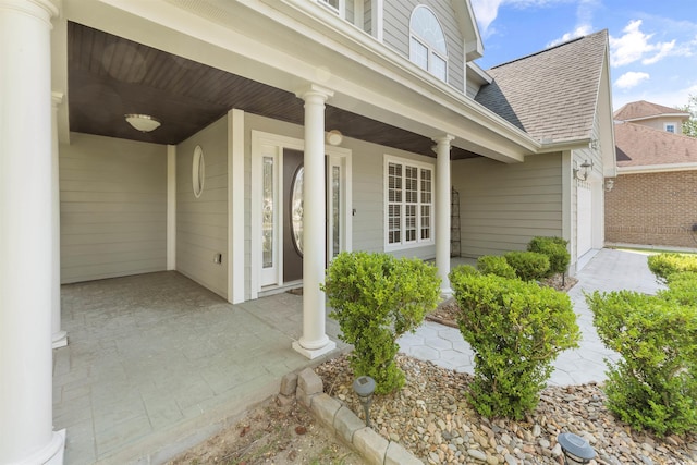 doorway to property featuring a porch