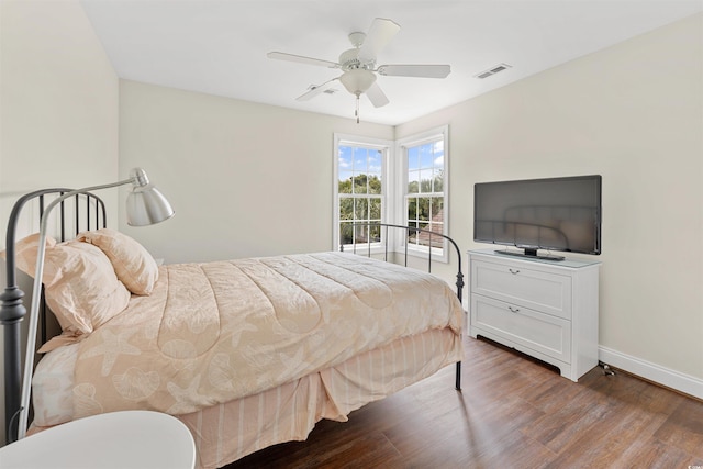 bedroom featuring ceiling fan and wood-type flooring