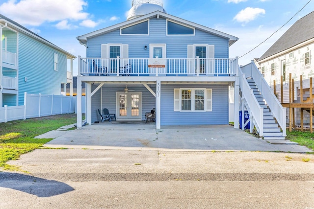 front facade featuring french doors