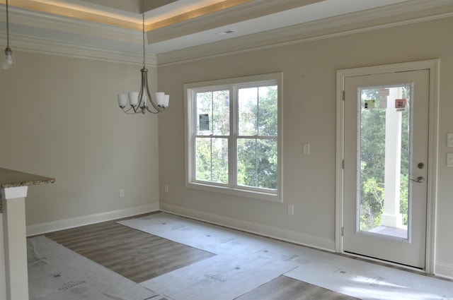 108 Hallandale Ln, Murrells Inlet, SC 29576 - entryway with ornamental molding, a chandelier, baseboards, and wood finished floors