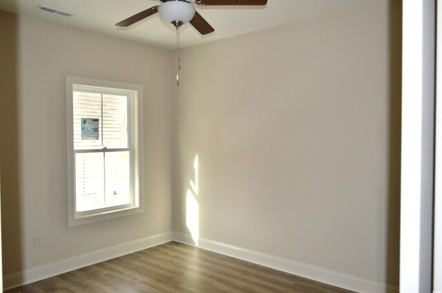 108 Hallandale Ln, Murrells Inlet, SC 29576 - spare room featuring ceiling fan, dark wood finished floors, and baseboards