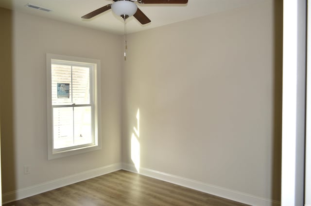108 Hallandale Ln, Murrells Inlet, SC 29576 - spare room featuring ceiling fan, dark wood finished floors, and baseboards