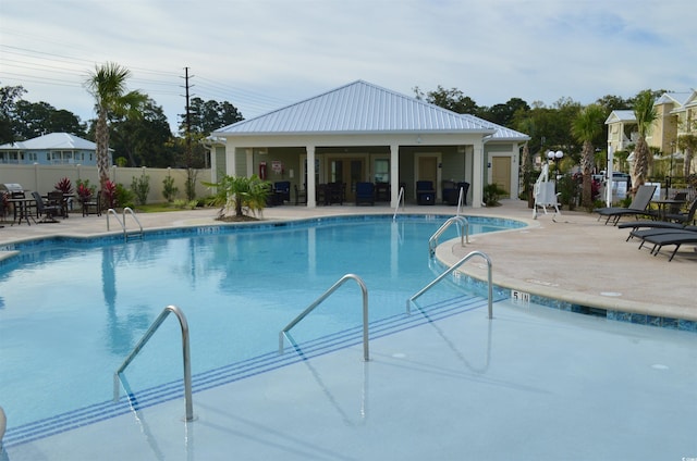 108 Hallandale Ln, Murrells Inlet, SC 29576 - community pool featuring a patio and fence