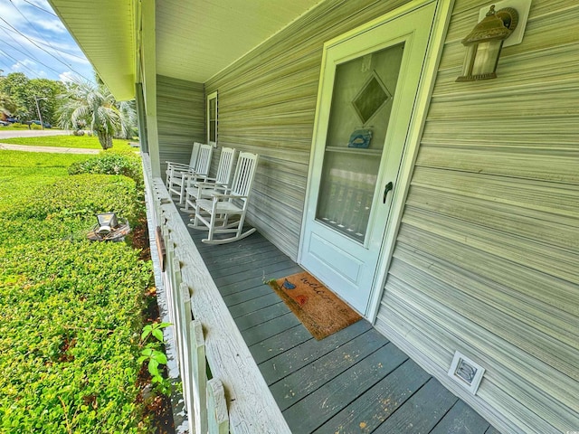 wooden deck with a porch