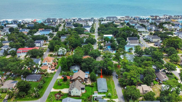 drone / aerial view featuring a water view and a residential view