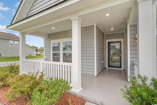 property entrance with a porch