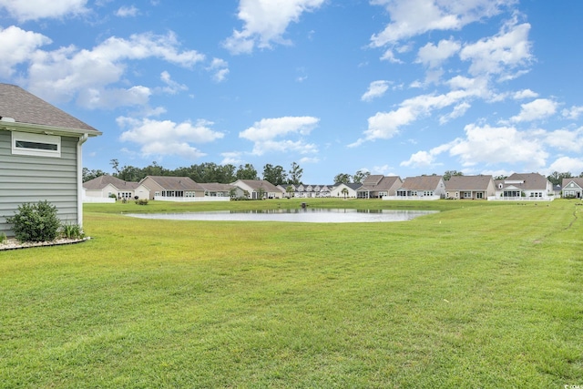 view of yard with a water view