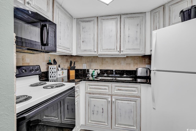 kitchen with light wood-type flooring and white fridge