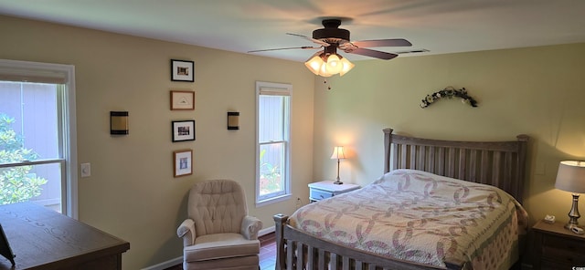 bedroom featuring ceiling fan and hardwood / wood-style flooring