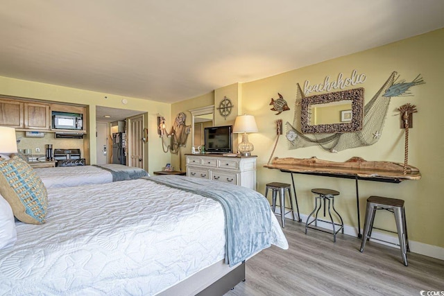 bedroom featuring light hardwood / wood-style flooring