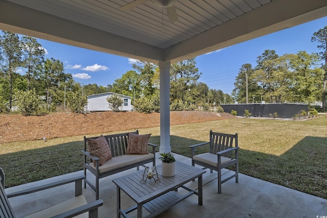 view of patio featuring an outdoor hangout area and ceiling fan