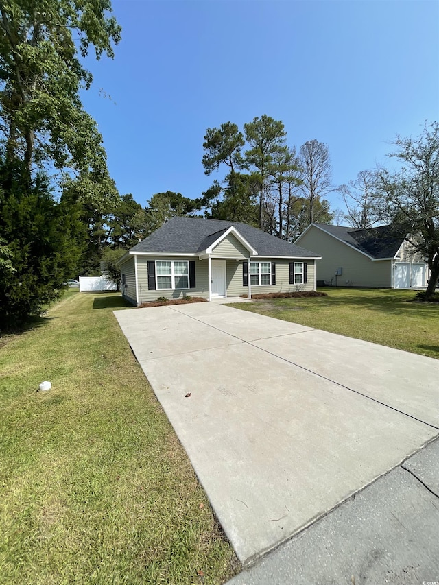 ranch-style house with a front lawn