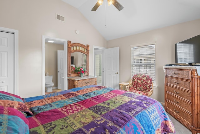 bedroom featuring carpet flooring, ensuite bath, ceiling fan, and high vaulted ceiling