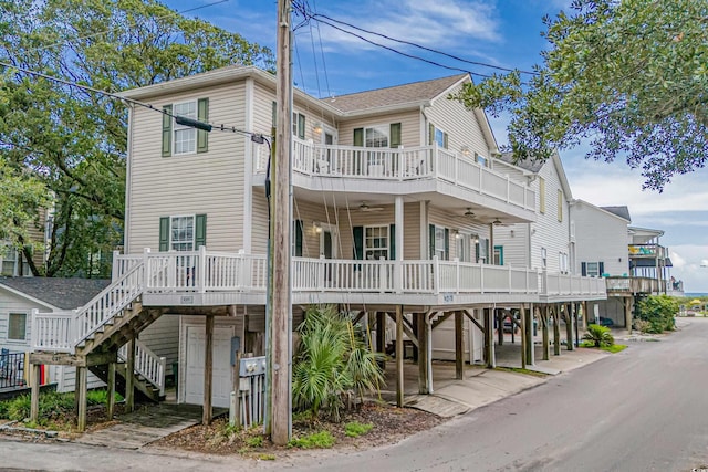 view of front of property featuring a porch and a carport