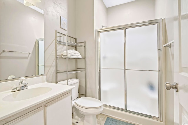 500 River Oaks Dr Unit 58I, Myrtle Beach, SC 29579 - bathroom featuring toilet, a shower with shower door, and vanity