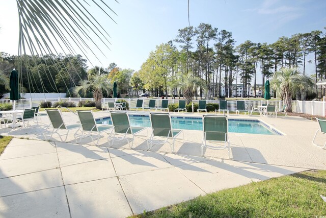 500 River Oaks Dr Unit 58I, Myrtle Beach, SC 29579 - view of swimming pool with a patio area