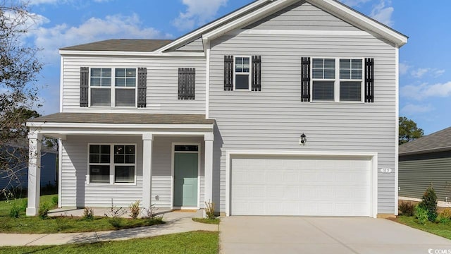 view of front of home with a garage