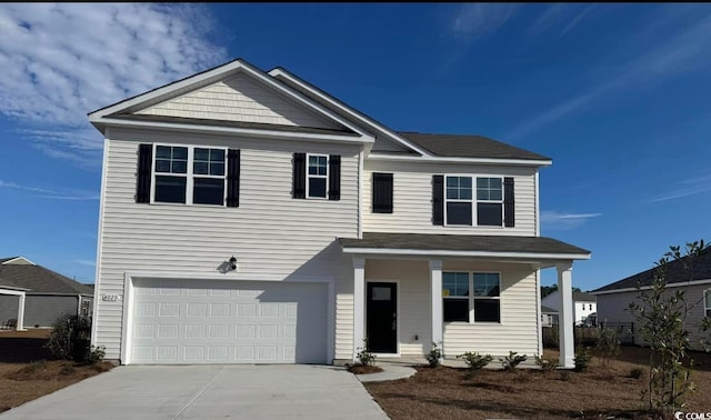 view of front of home with a garage