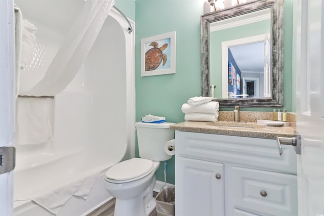 bathroom with vanity, toilet, and a shower with shower curtain