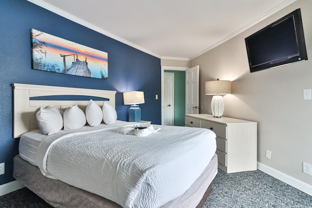 carpeted bedroom featuring baseboards and crown molding