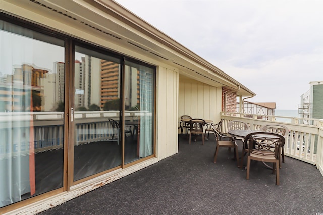 balcony featuring outdoor dining space