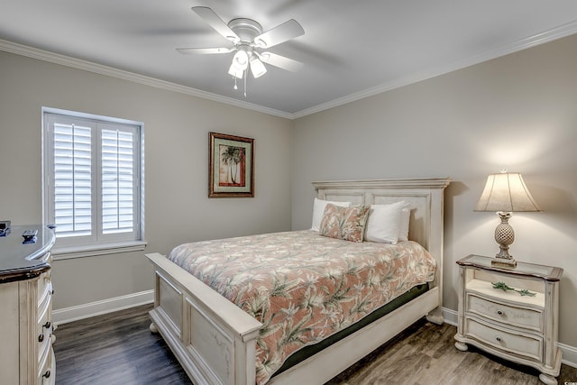 bedroom featuring baseboards, dark wood finished floors, and ornamental molding