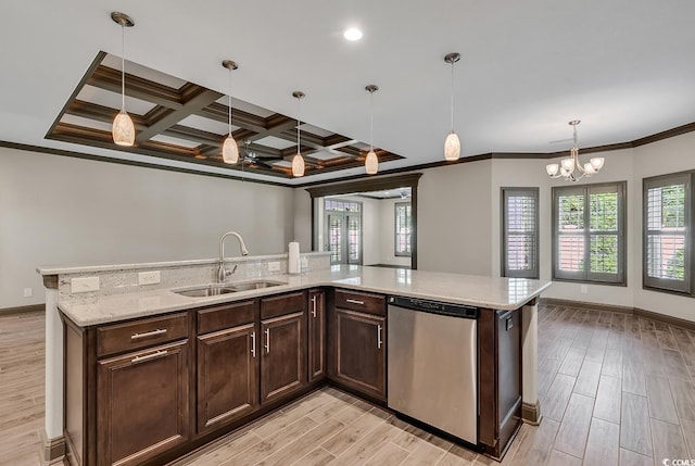 kitchen with an island with sink, stainless steel dishwasher, light wood-type flooring, sink, and coffered ceiling