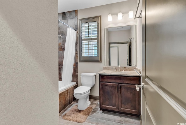 full bathroom with vanity, hardwood / wood-style flooring, toilet, and shower / bathtub combination with curtain