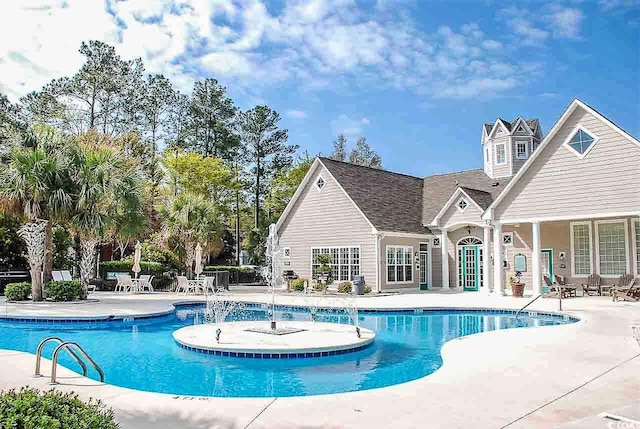 view of swimming pool featuring a patio