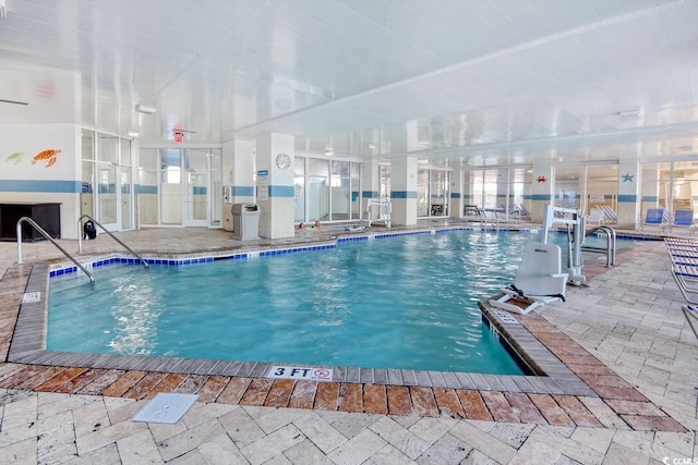 community pool with a patio area